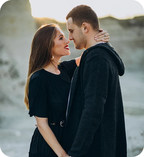 Intimate couple surrounded by lights