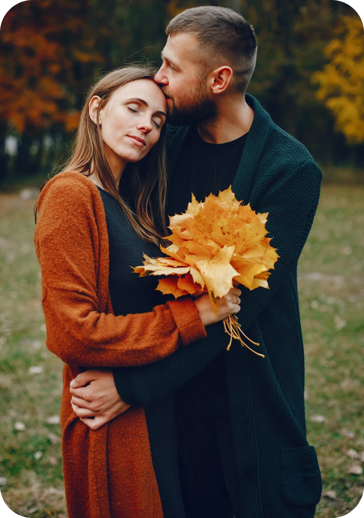 Young couple walking in autumn park
