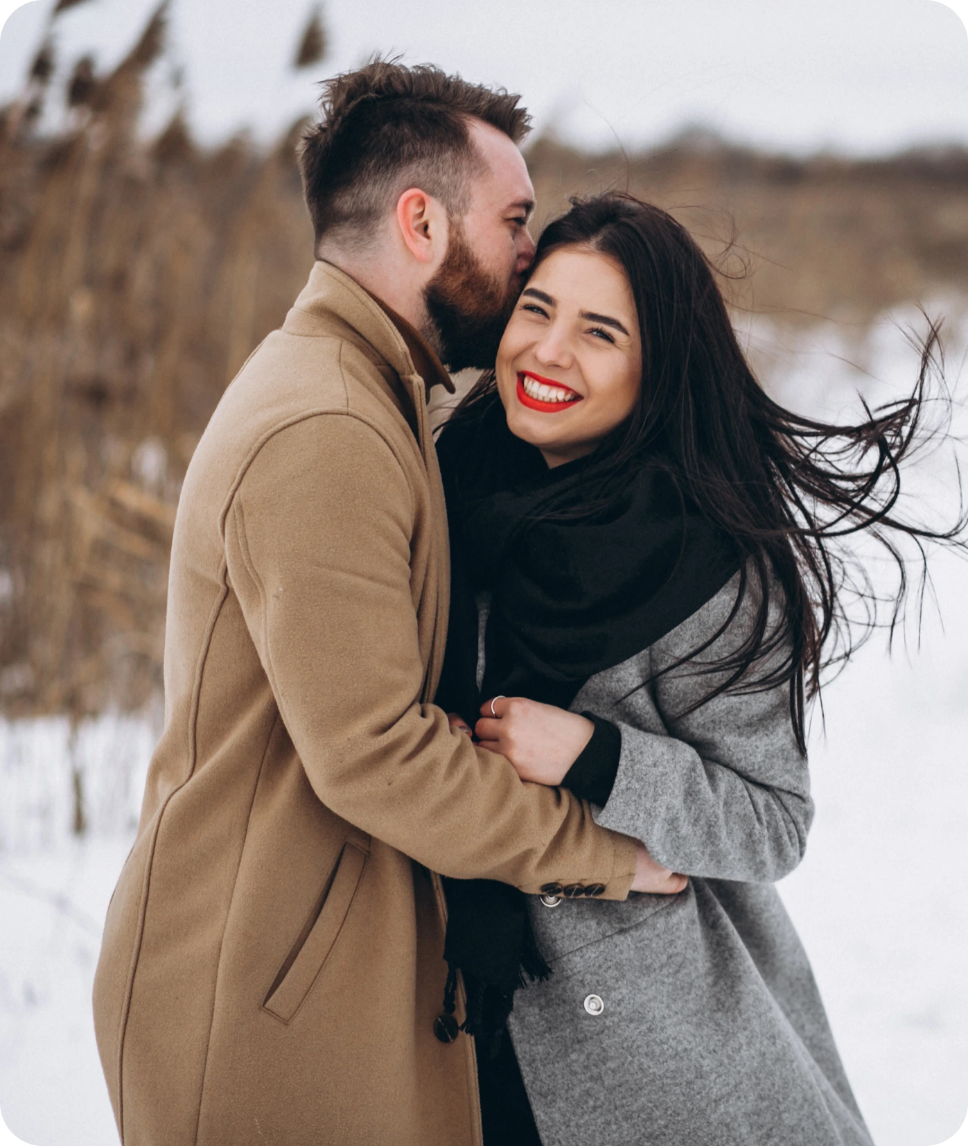 Young couple in winter park